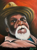 Artistic portrait of an elderly man with a wide-brimmed hat against a red background