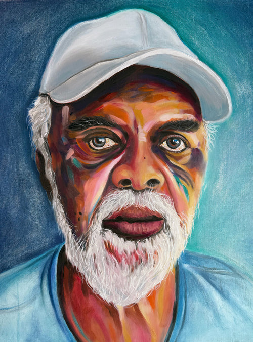 Colorful portrait of a man wearing a white cap against a blue background